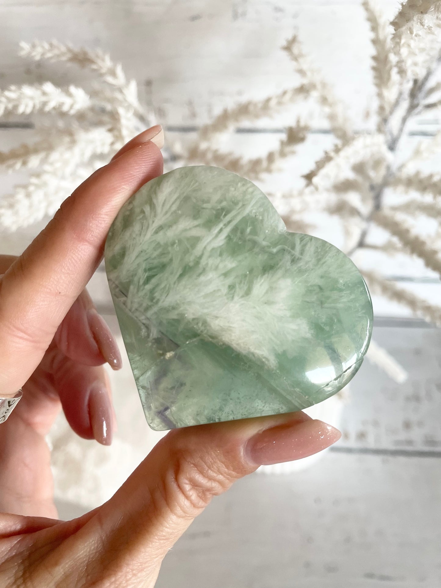 Green snowflake fluorite heart