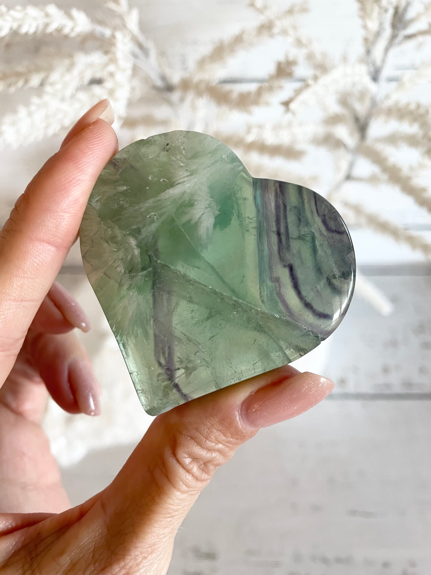 Green snowflake fluorite heart