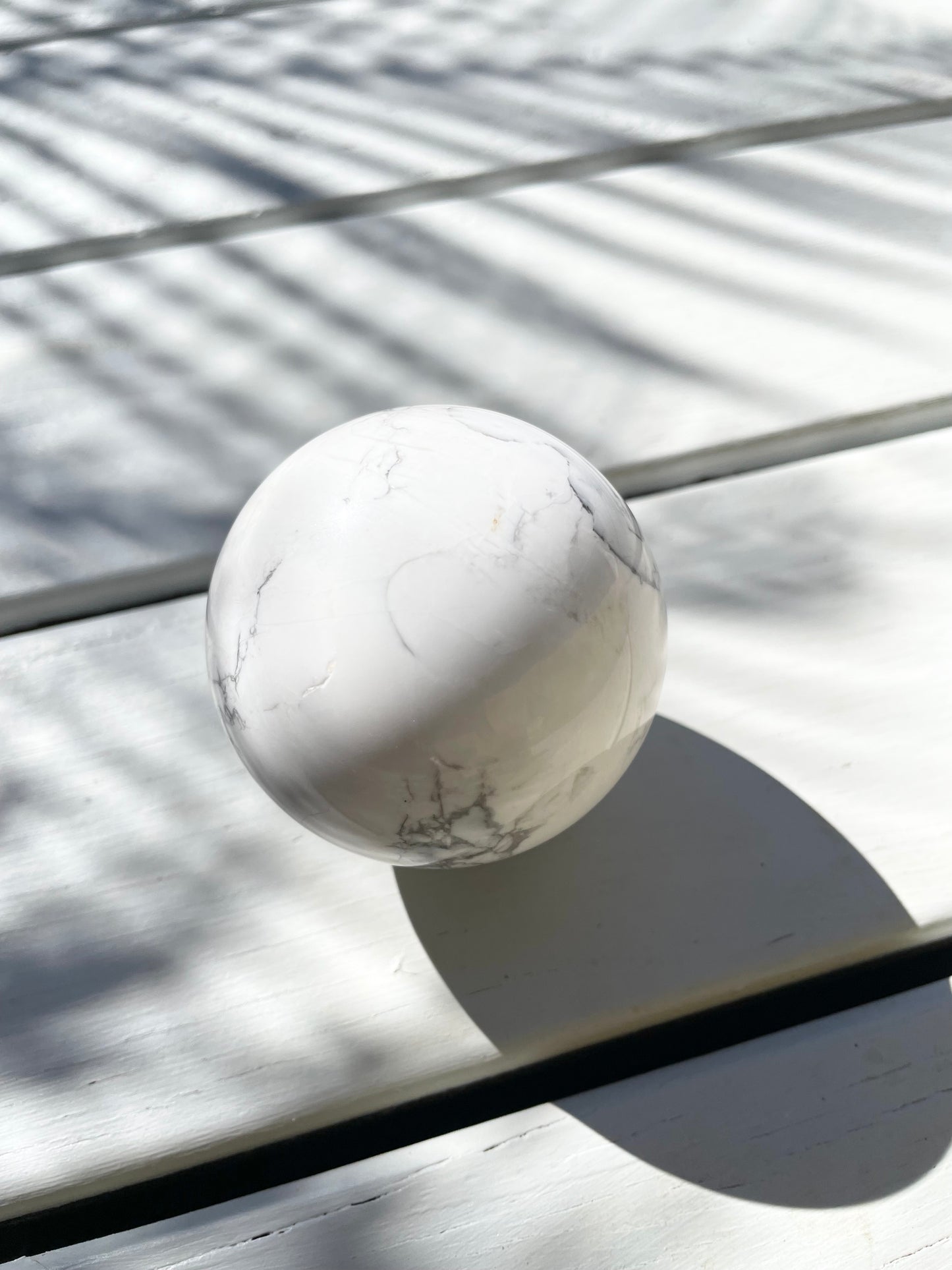 White Howlite Sphere includes holder