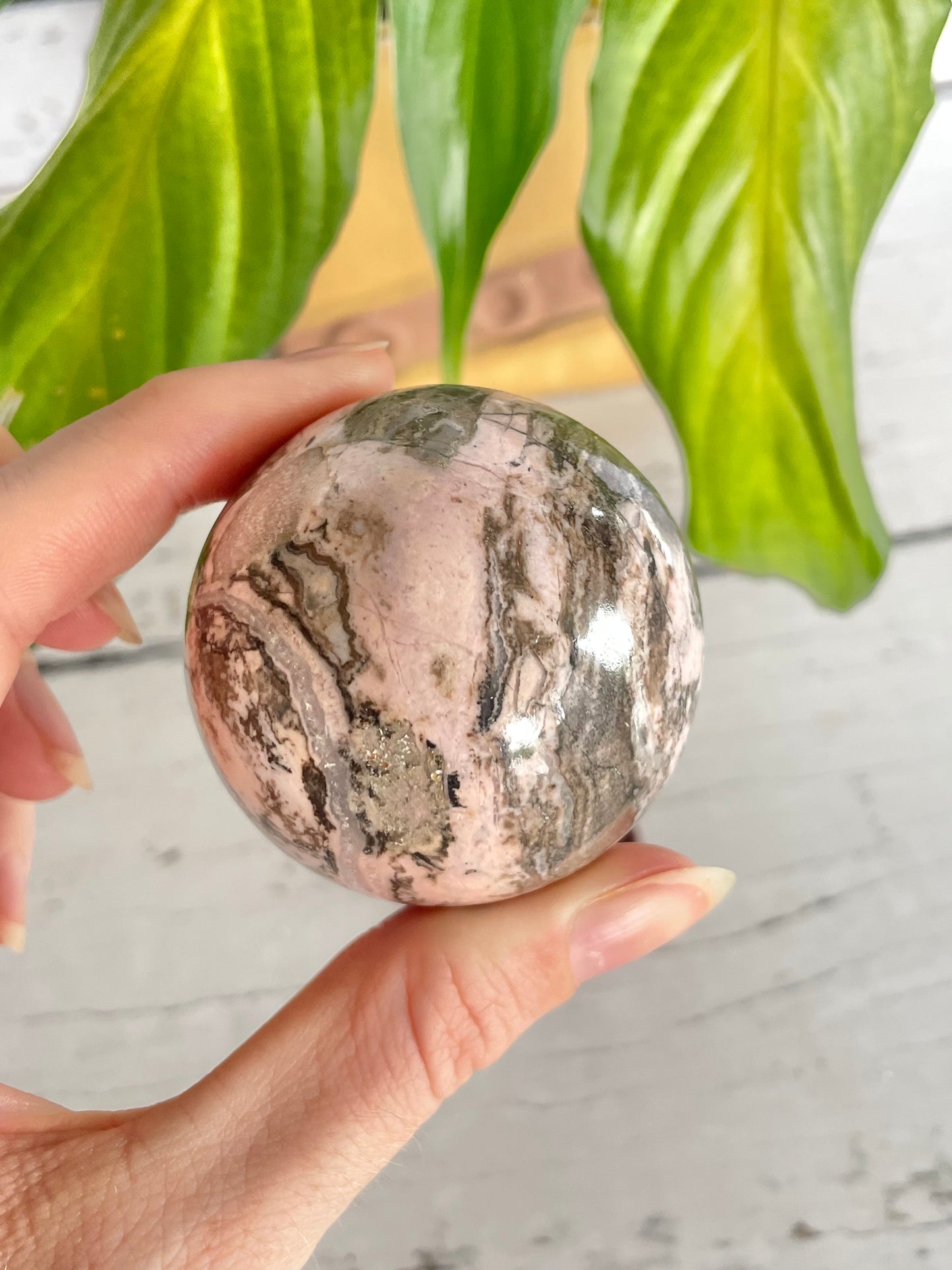 Rhodochrosite Sphere Includes Holder