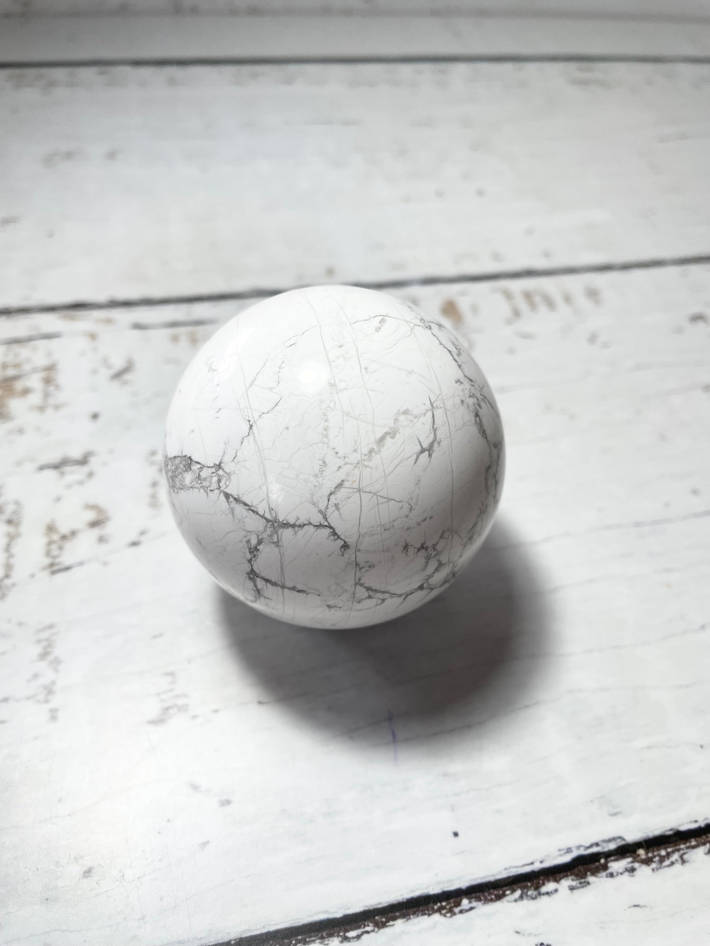 White Howlite Sphere includes holder