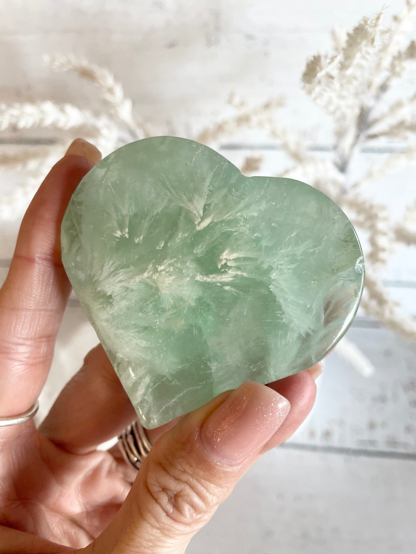 Green snowflake fluorite heart