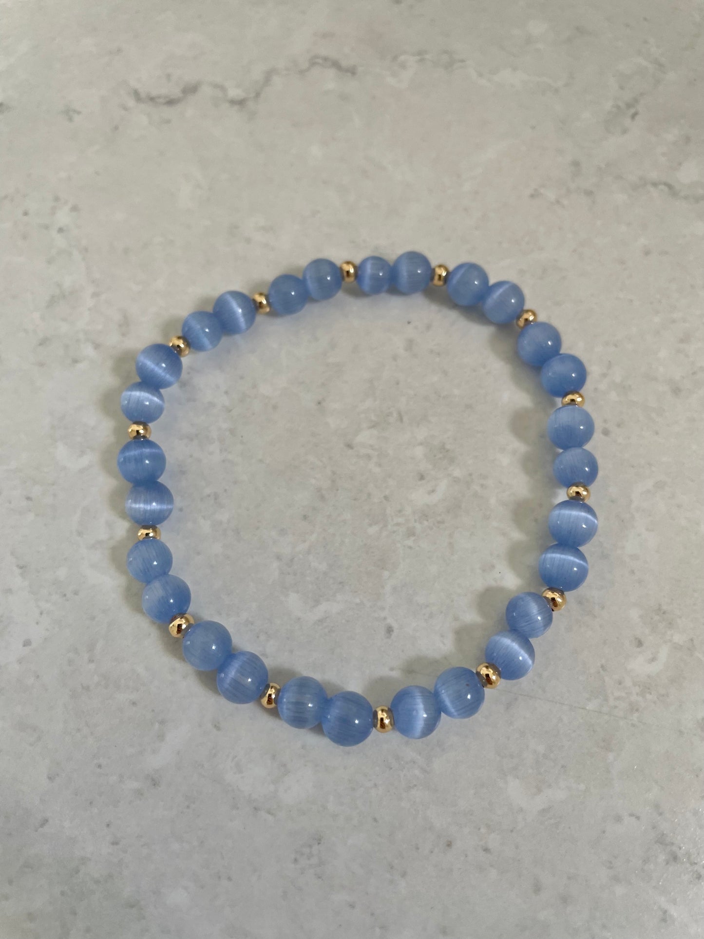 Cornflower Blue Cats Eye with gold Bracelet