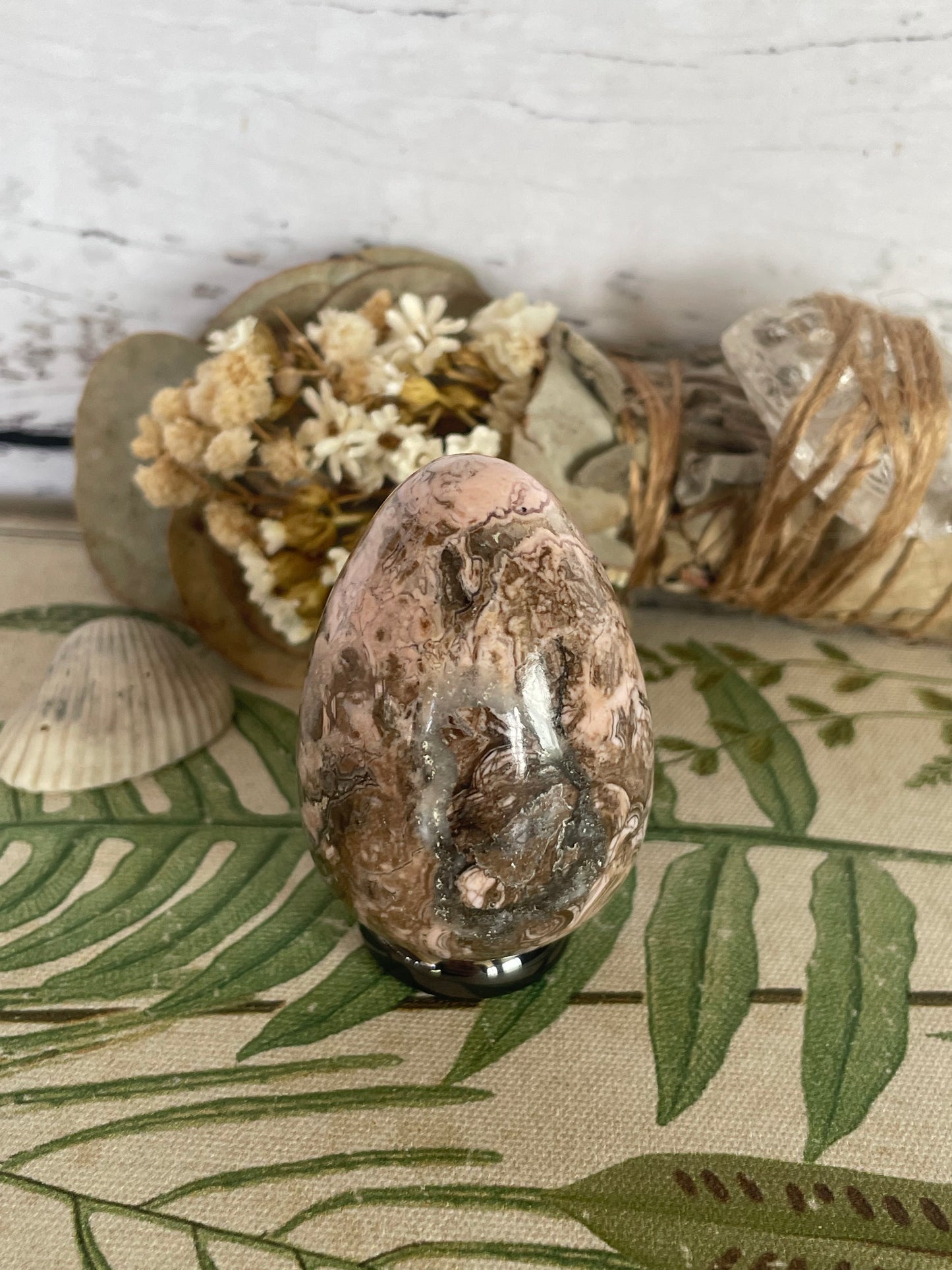 Rhodochrosite Egg with holder