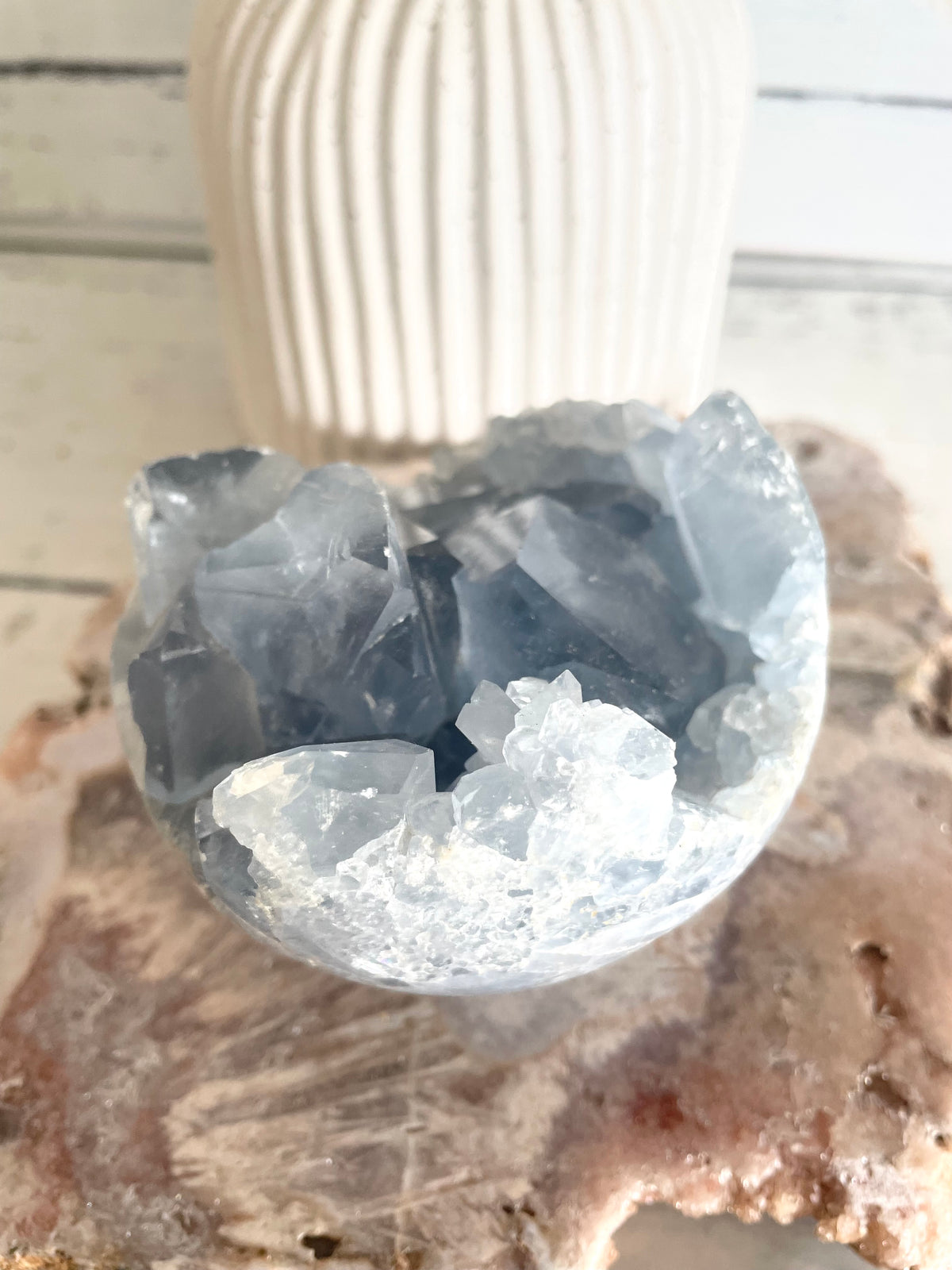 Celestite Geode Sphere includes hematite holder