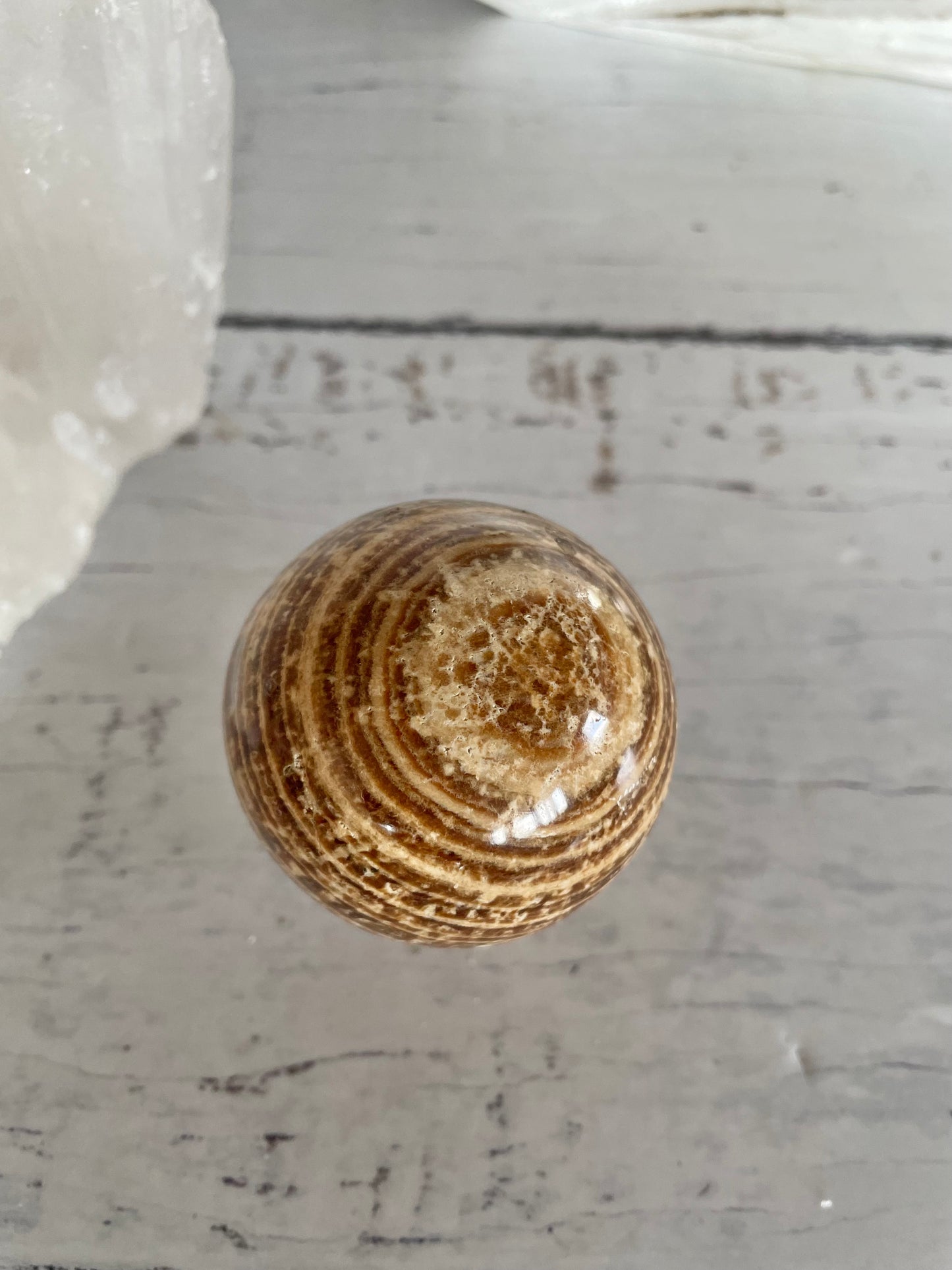 Aragonite Sphere Includes Wooden Holder