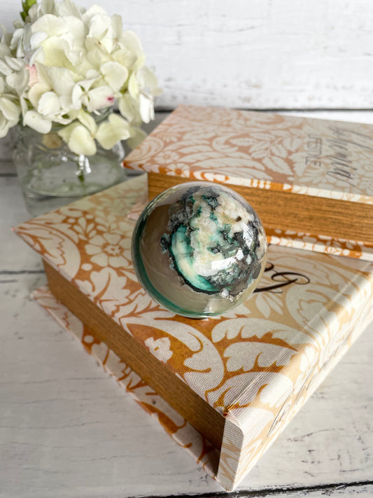 Green Flower Agate Sphere includes wooden holder