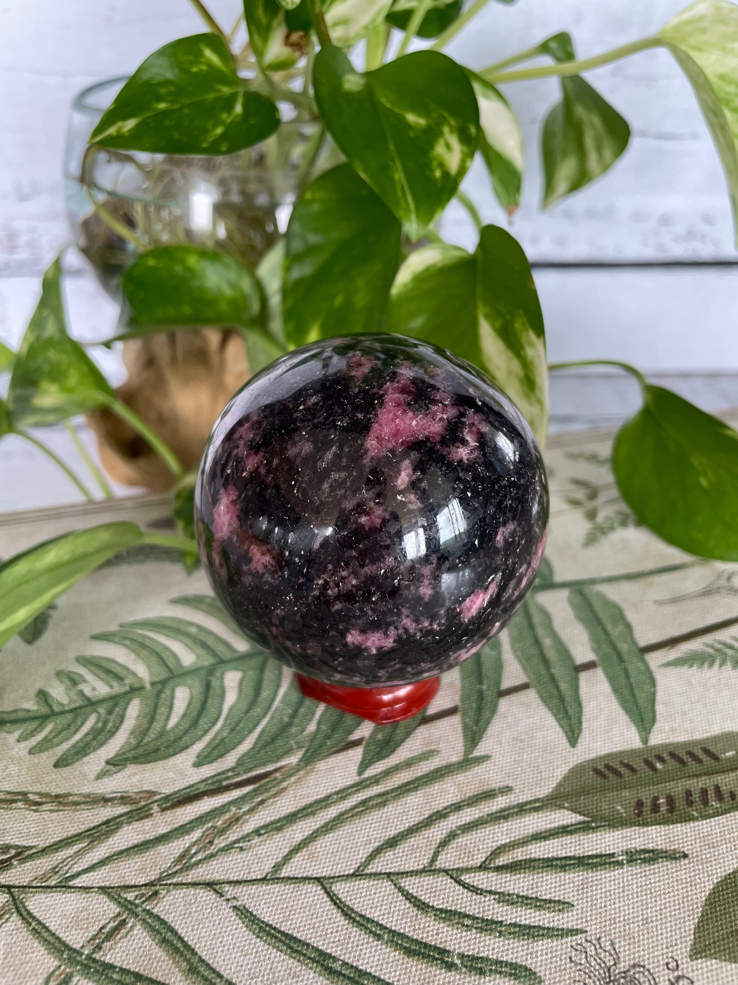 Rhodonite Sphere Includes Wooden Holder