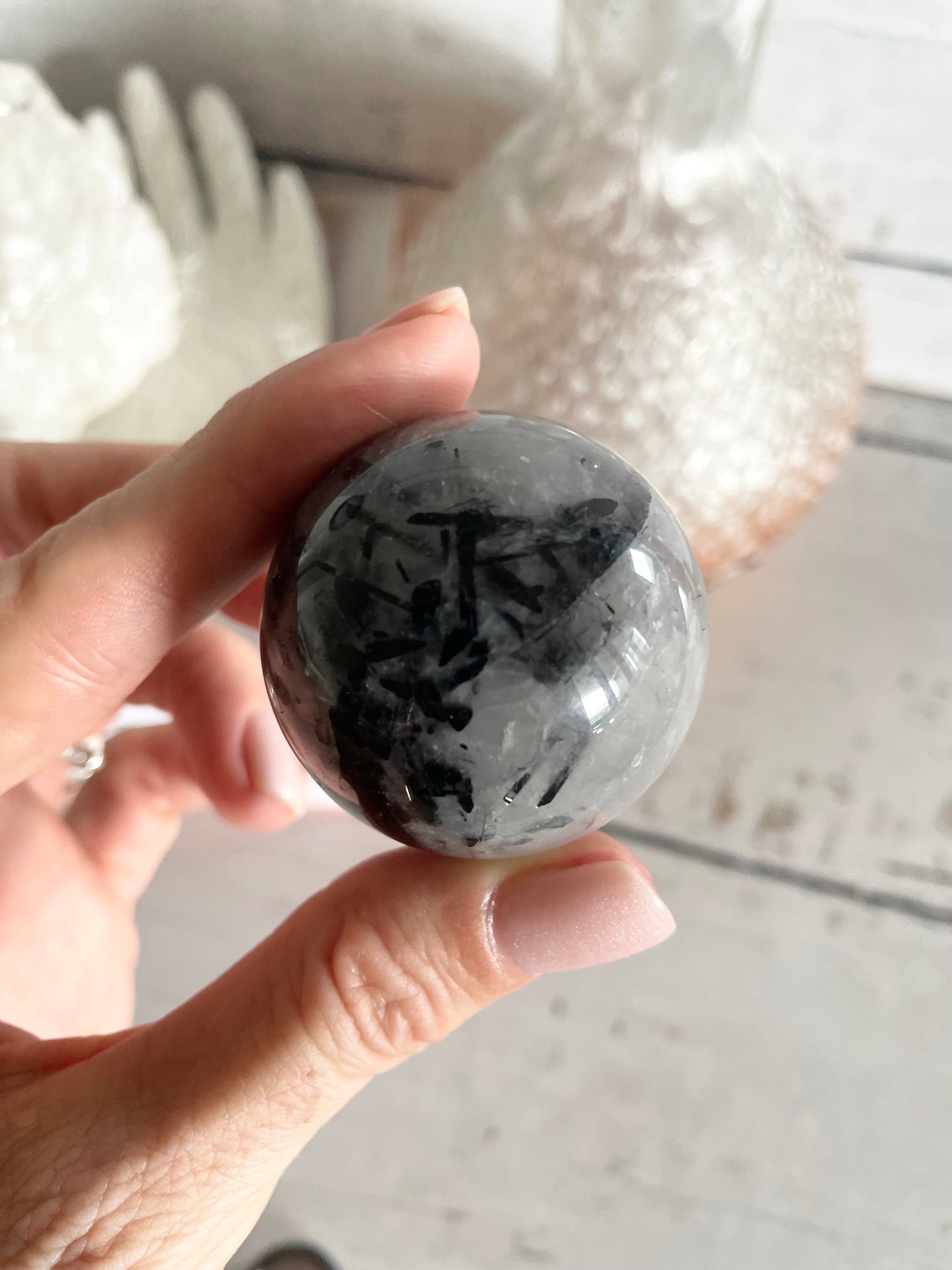 Tourmaline In Quartz Sphere Includes Holder