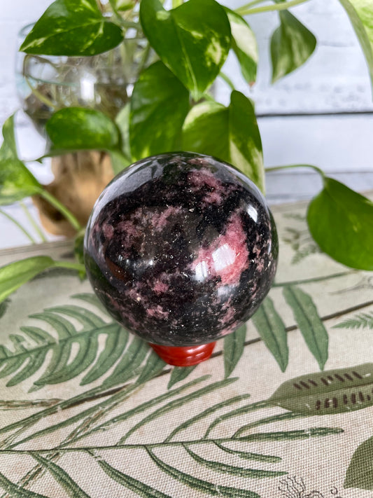 Rhodonite Sphere Includes Wooden Holder