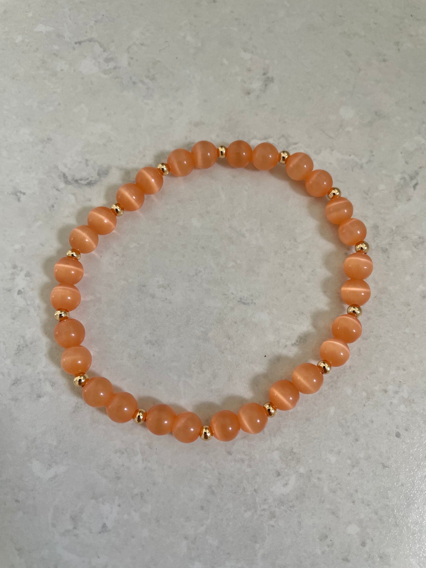 Salmon Cats Eye with gold Bracelet