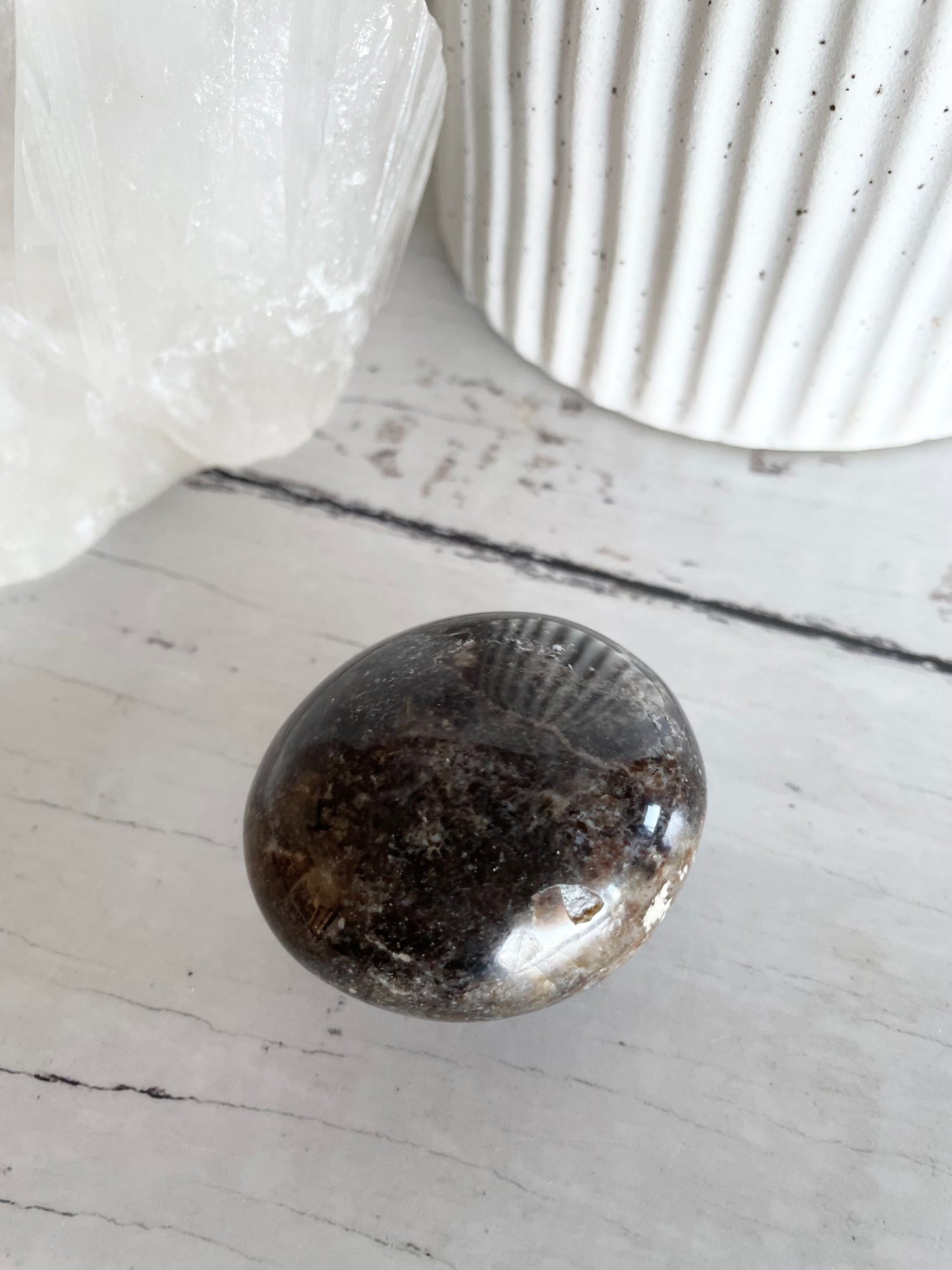 Black Opal Pillow Palm Stone