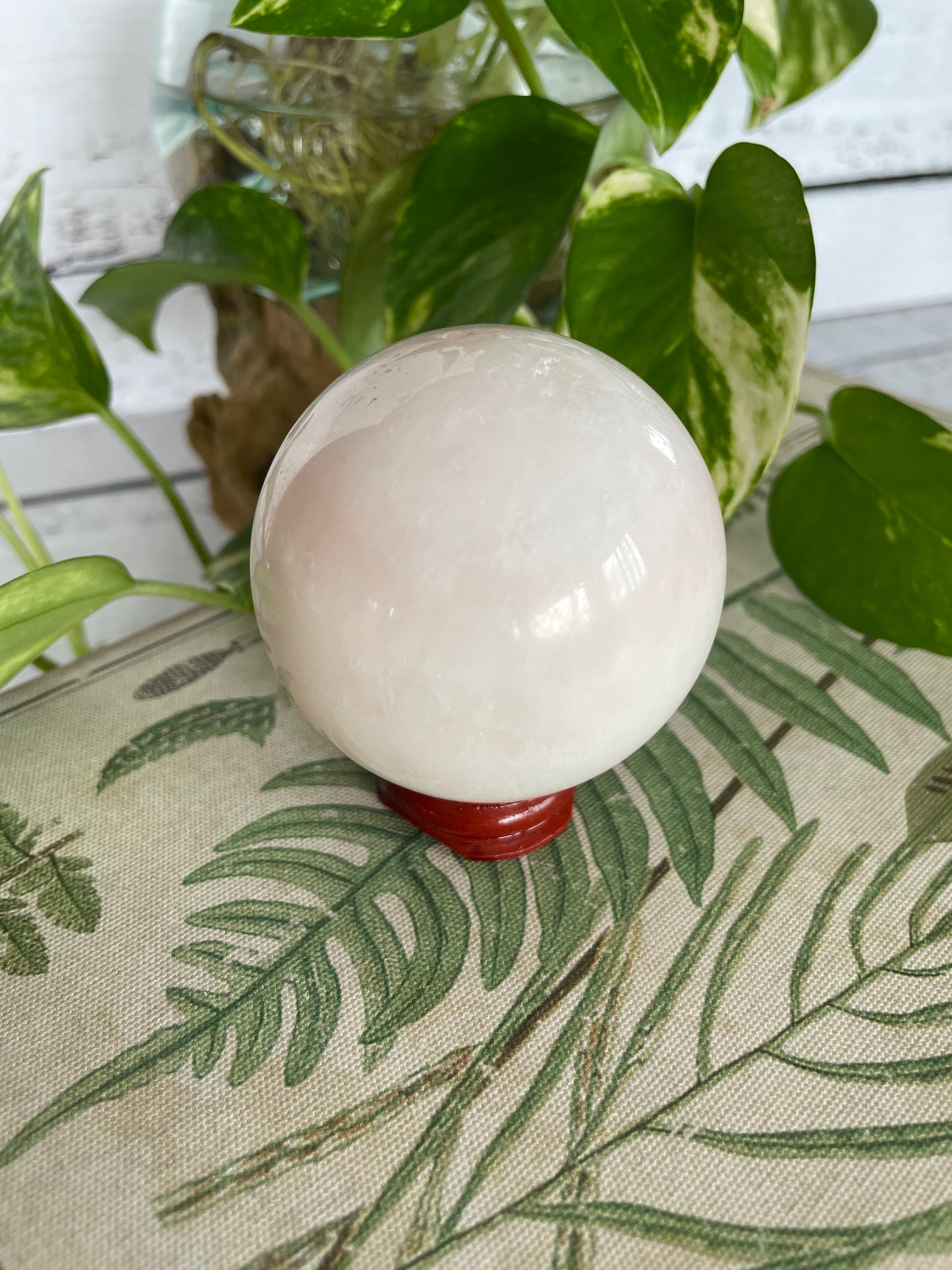 Mangano Calcite Sphere Includes Wooden Holder