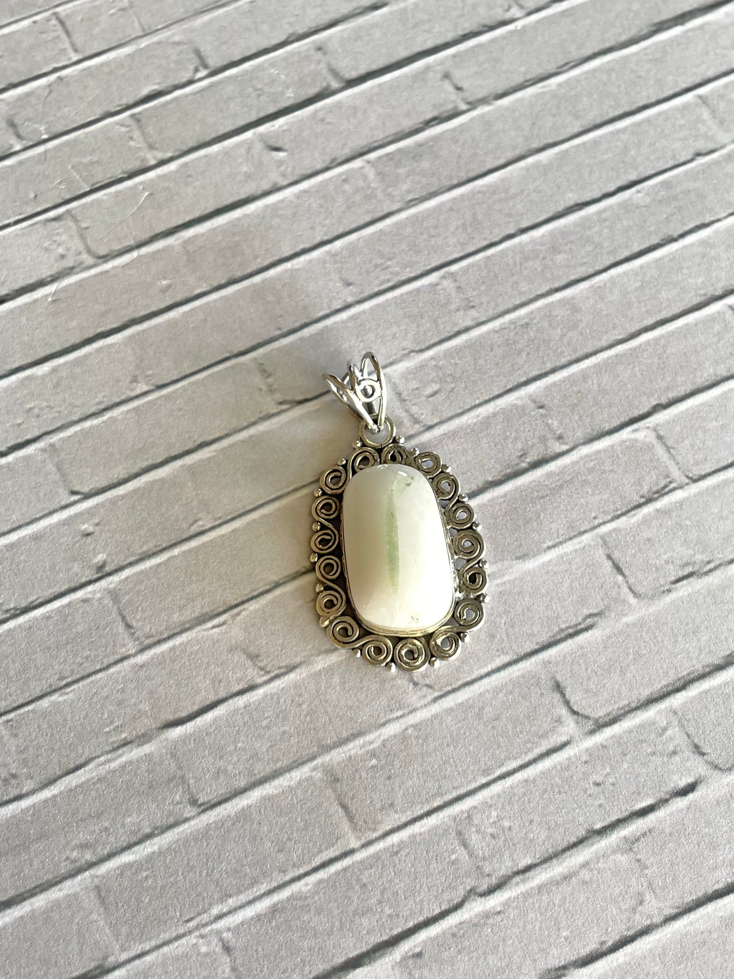 Green Tourmaline in Quartz Pendant
