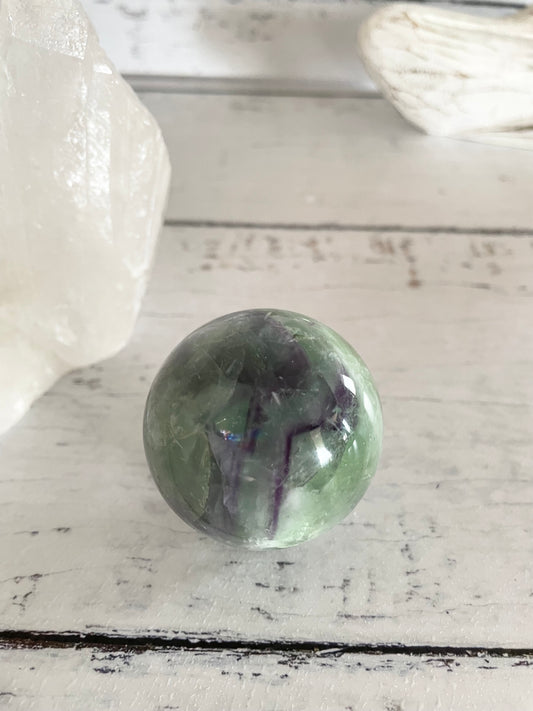 Rainbow Fluorite Sphere Includes Wooden Holder