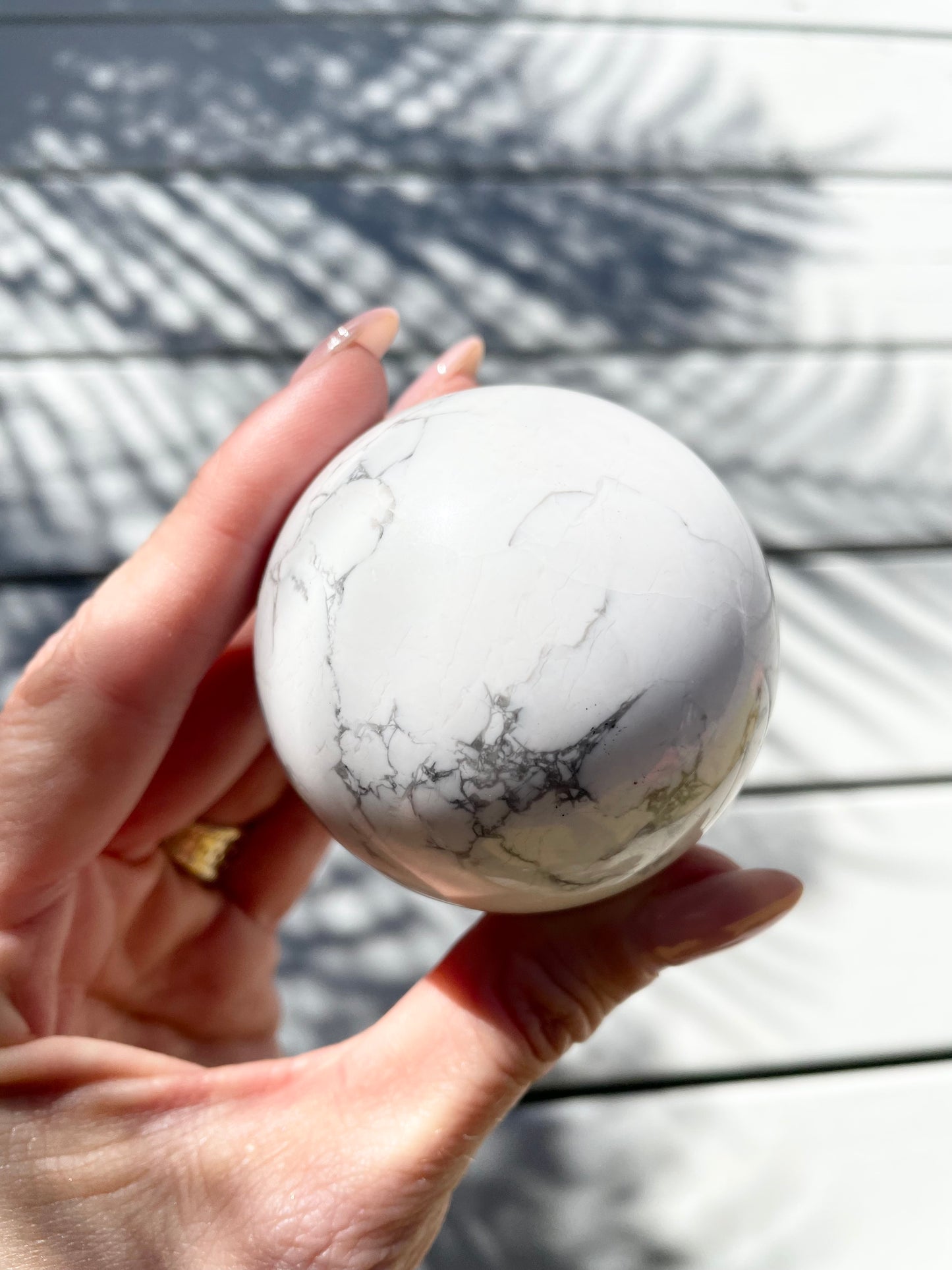 White Howlite Sphere includes holder