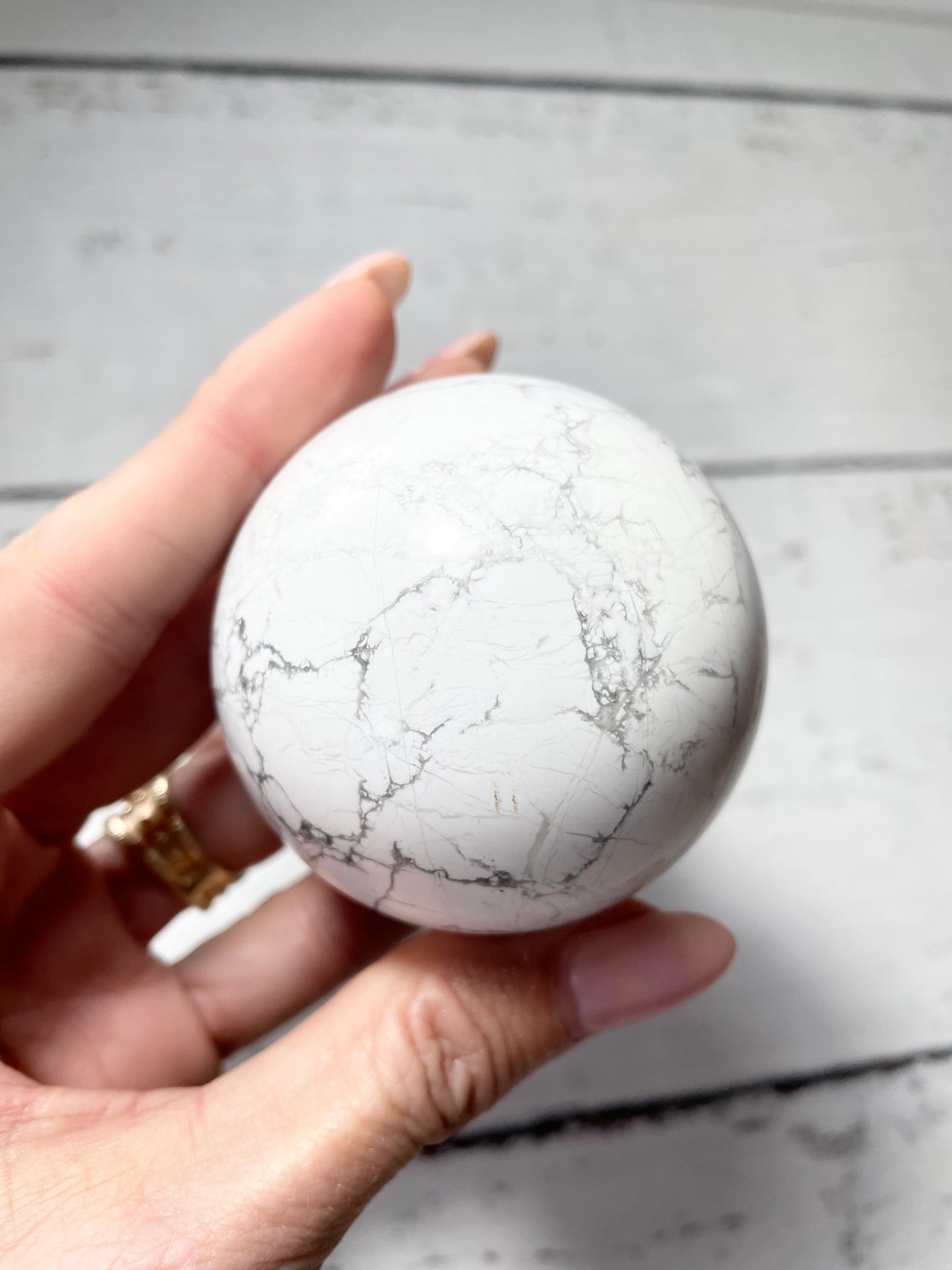 White Howlite Sphere includes holder