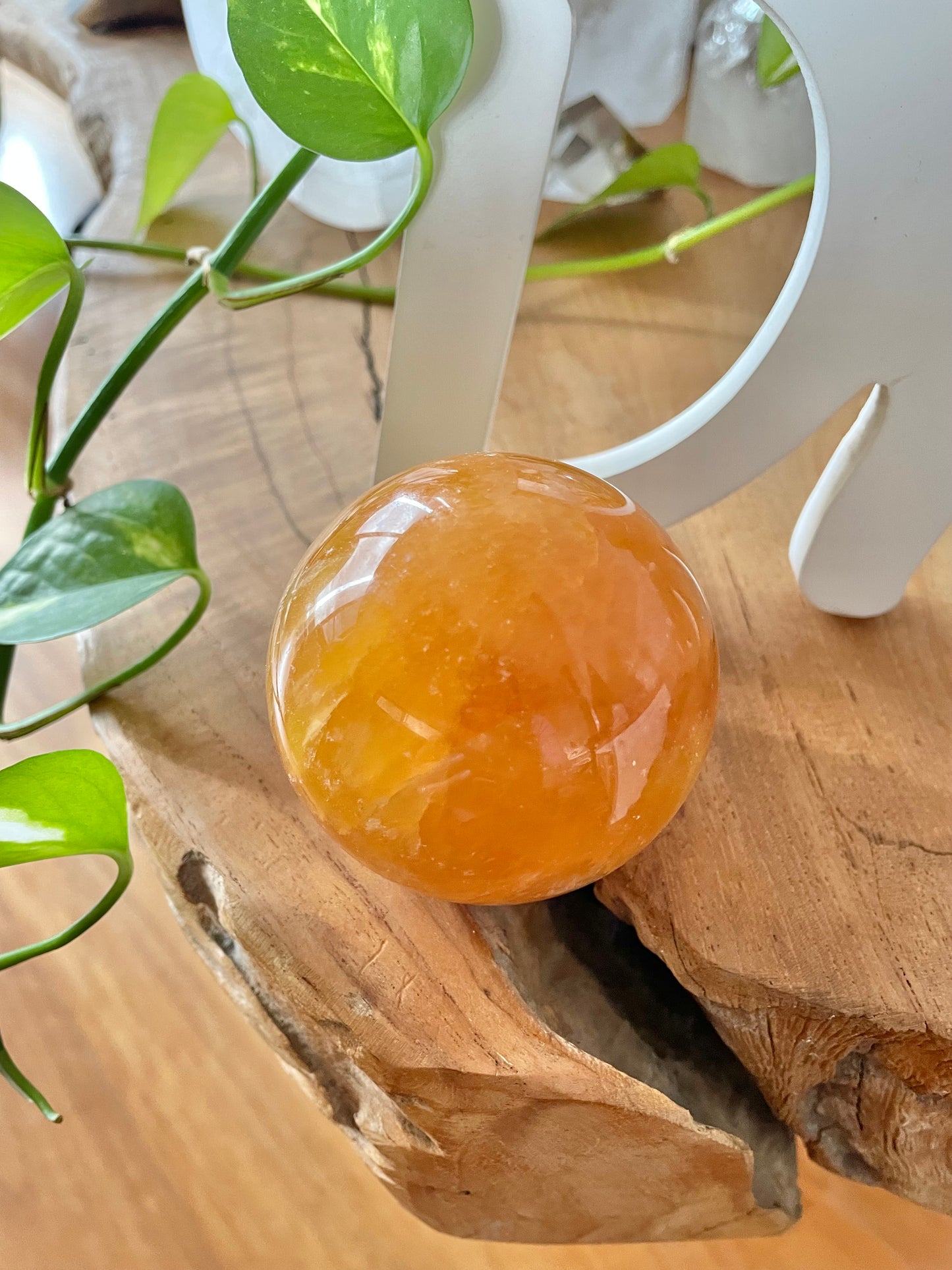 Orange Calcite Sphere Includes Wooden Holder