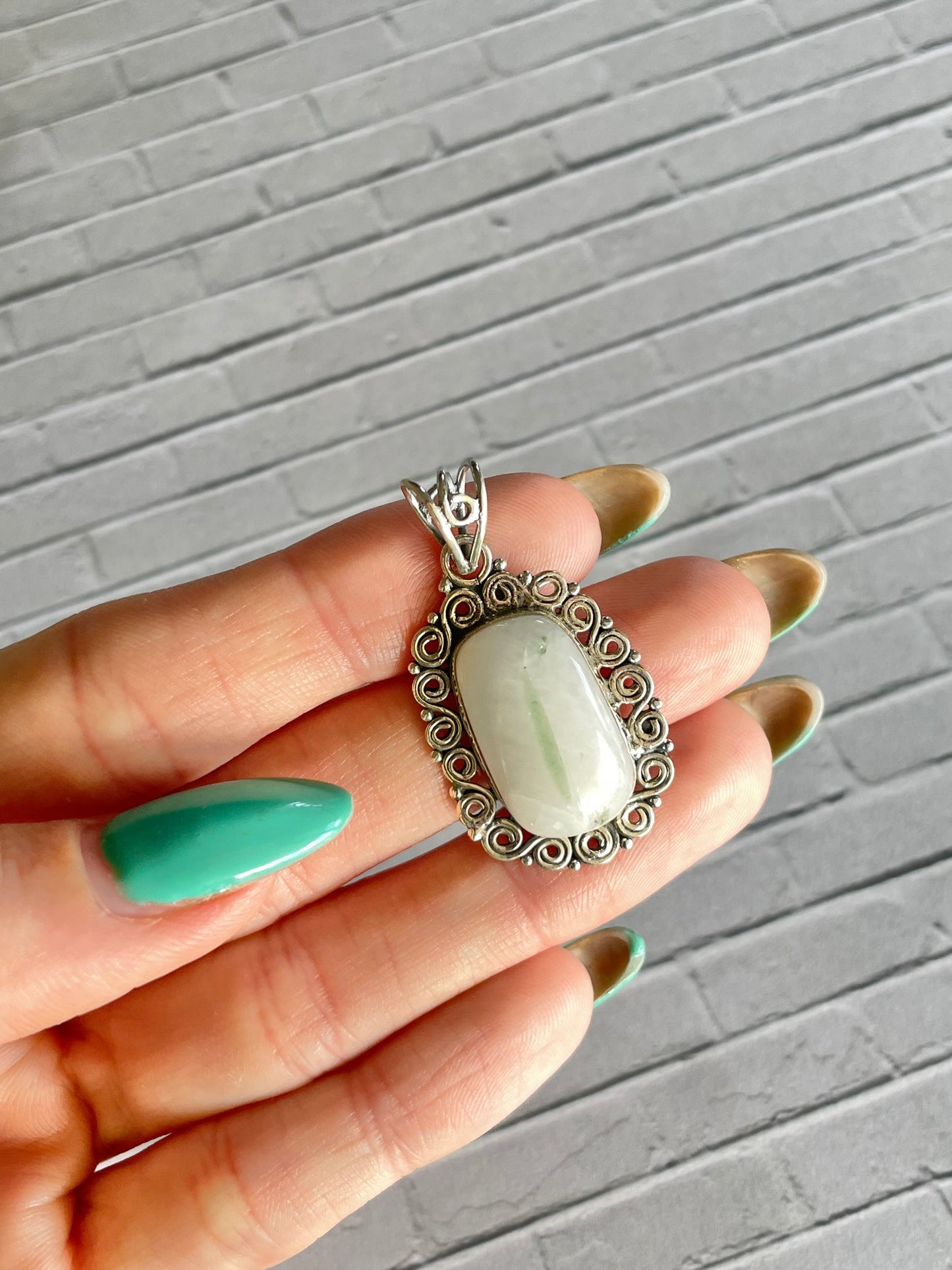 Green Tourmaline in Quartz Pendant