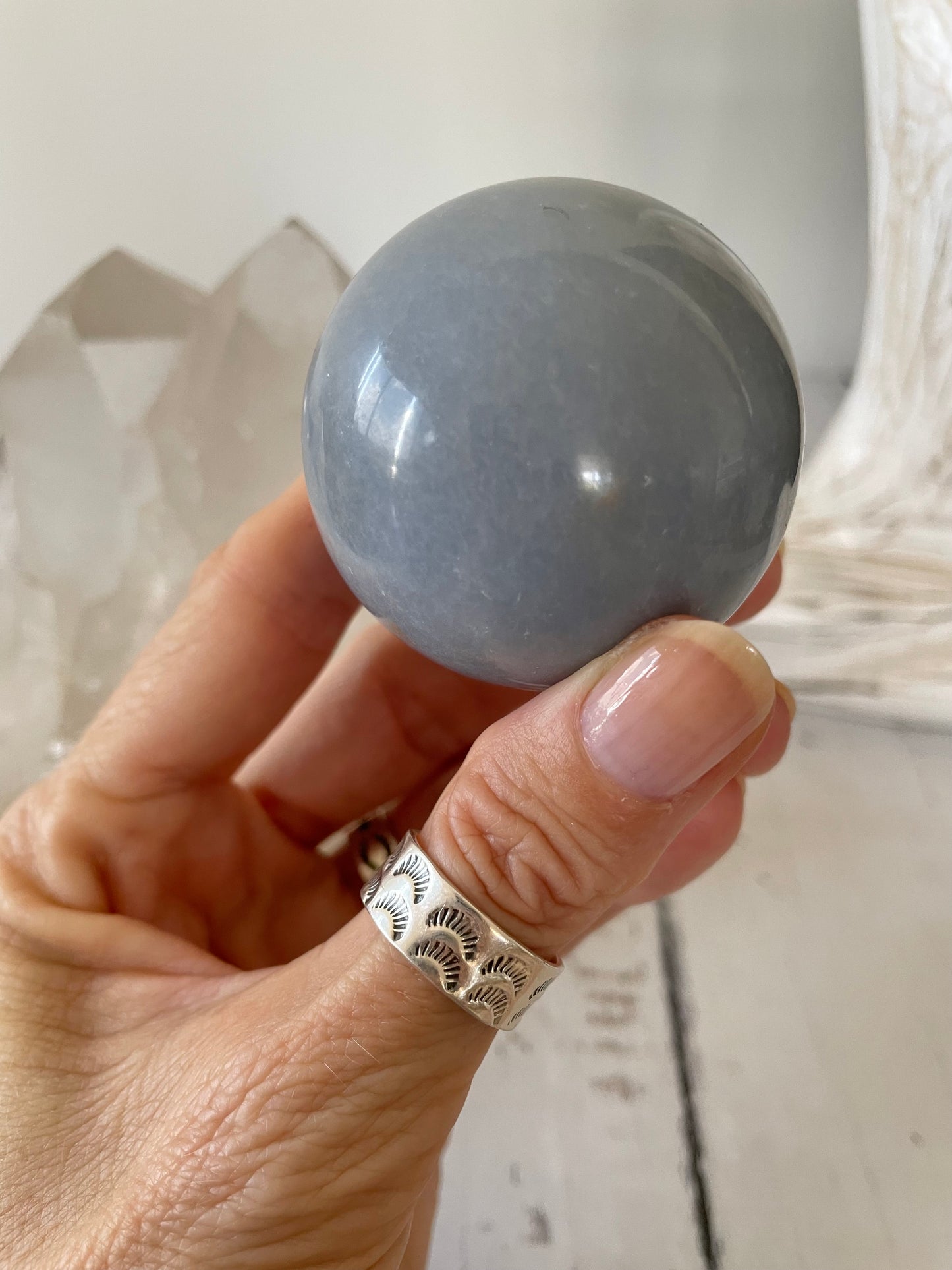 Angelite Sphere Includes Wooden Holder