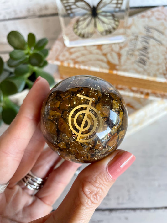 Orgone Sphere - Tigers Eye Includes Wooden holder