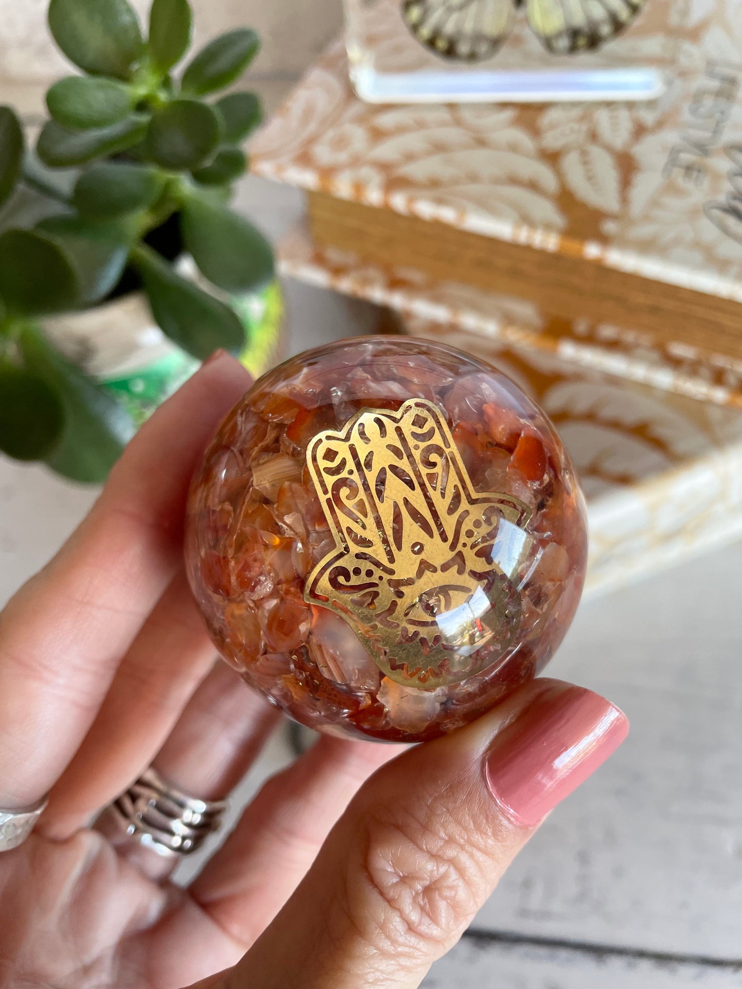 Orgone Sphere - Carnelian Includes Wooden holder