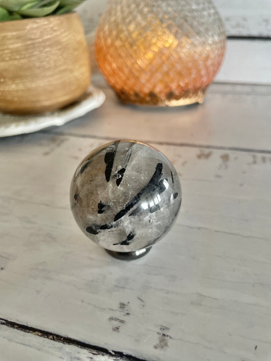 Tourmaline In Quartz Sphere Includes Holder