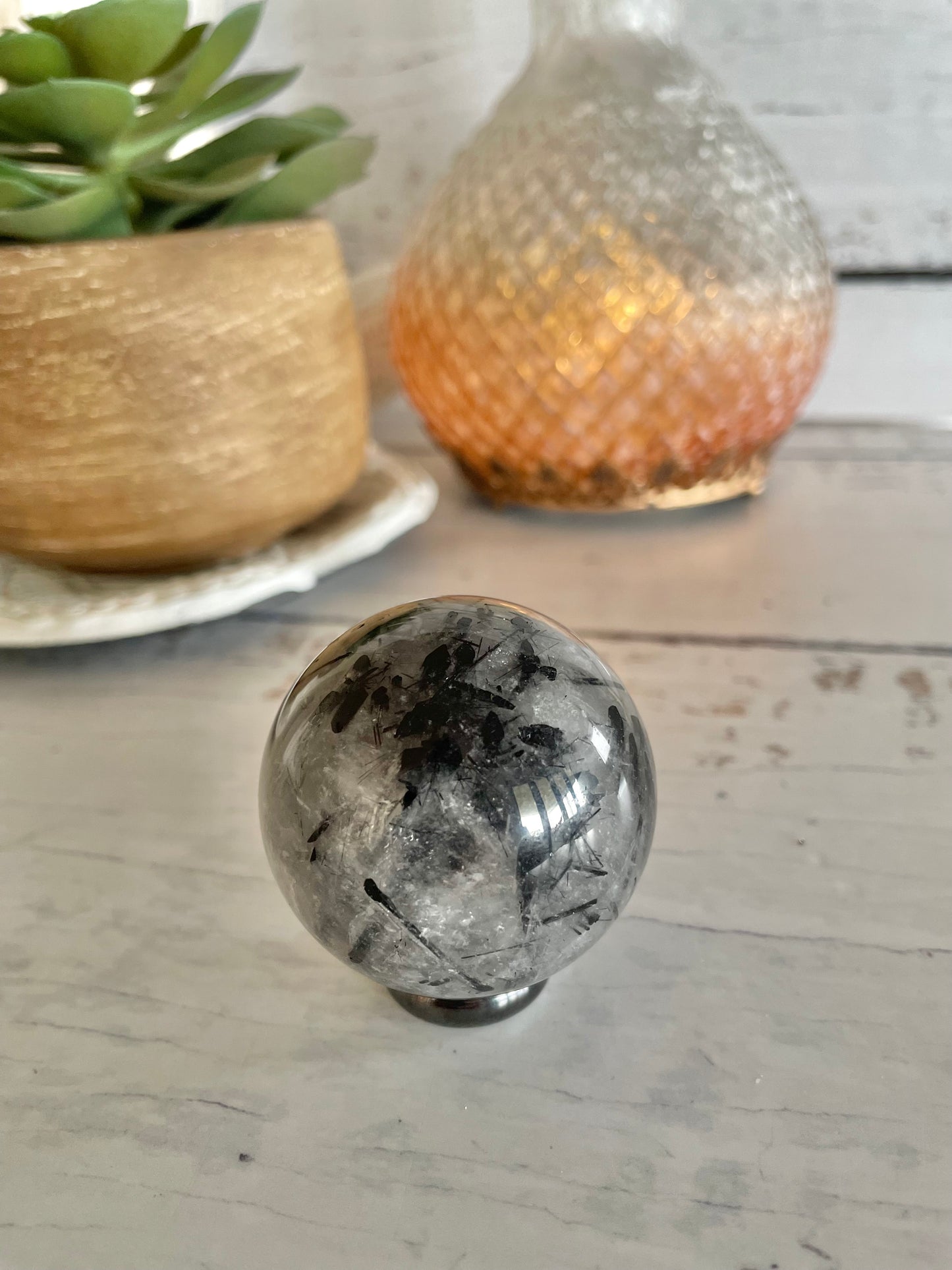 Tourmaline In Quartz Sphere Includes Holder