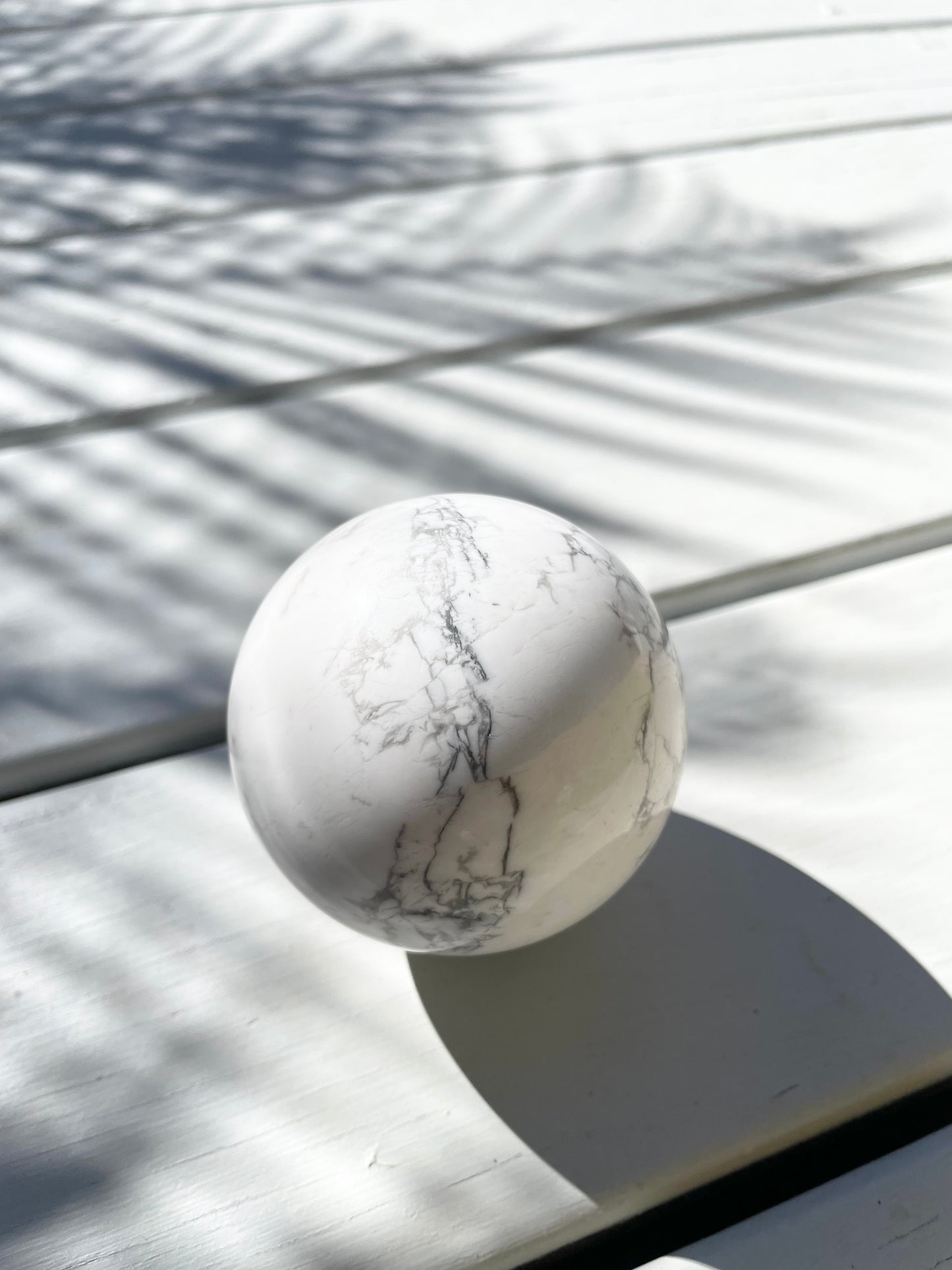 White Howlite Sphere includes holder