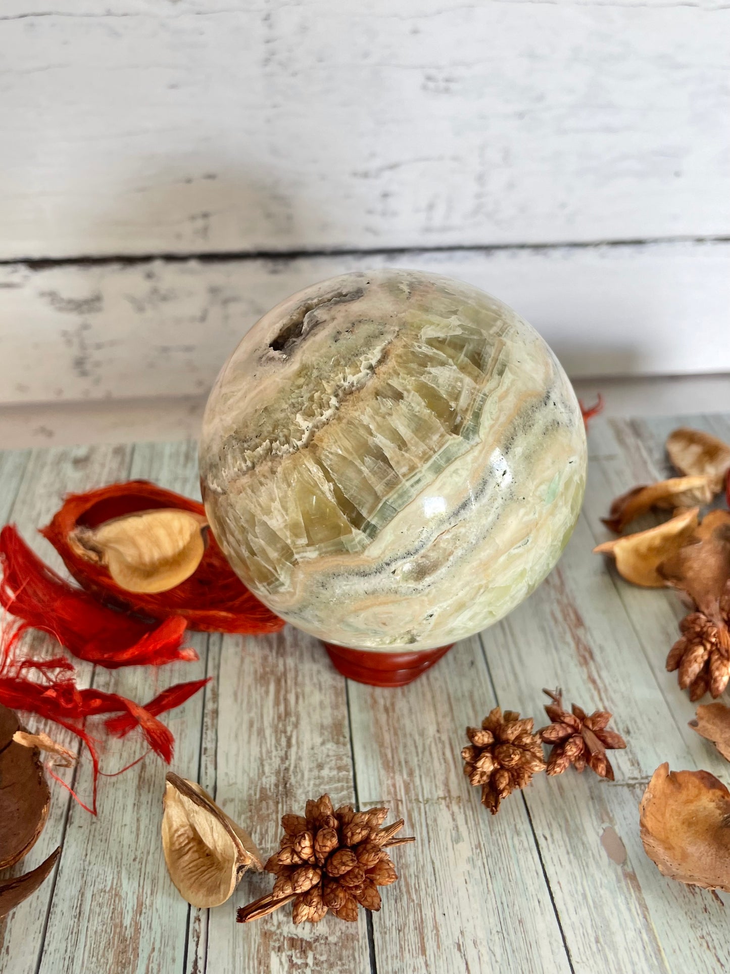 Green Calcite  Sphere Includes Wooden Holder