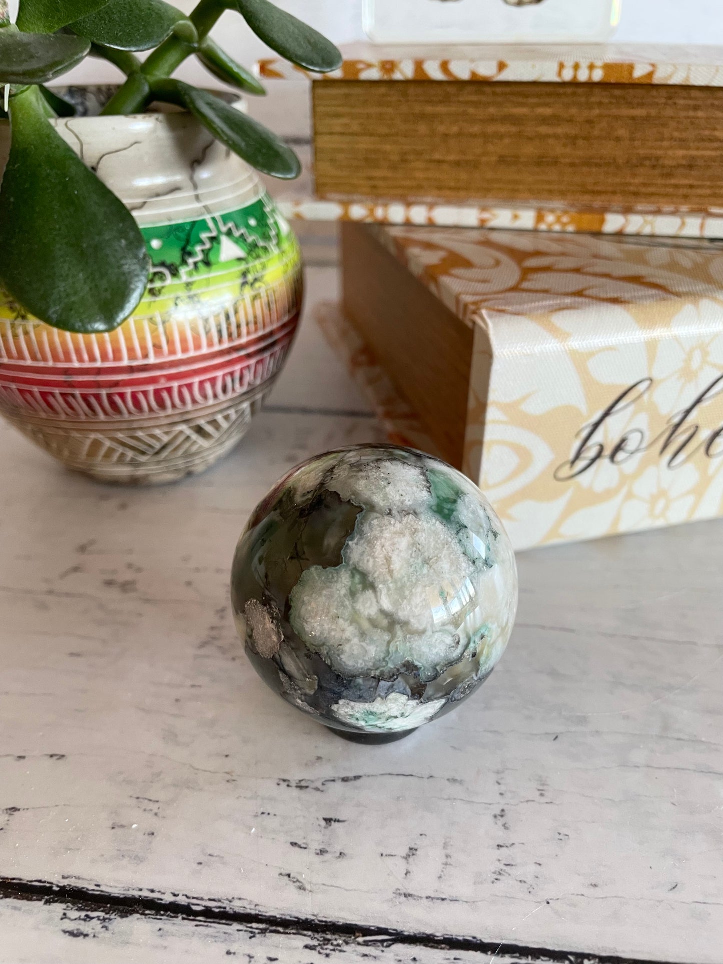 Green Flower Agate Sphere includes wooden holder