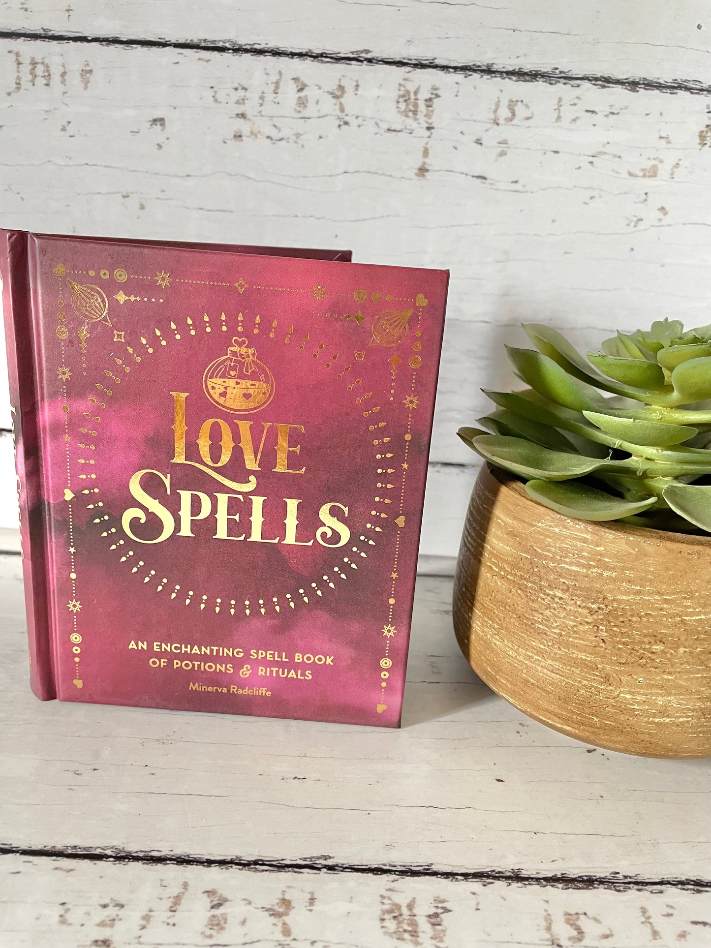 Love Spells : an enchanting spell book of potions & rituals