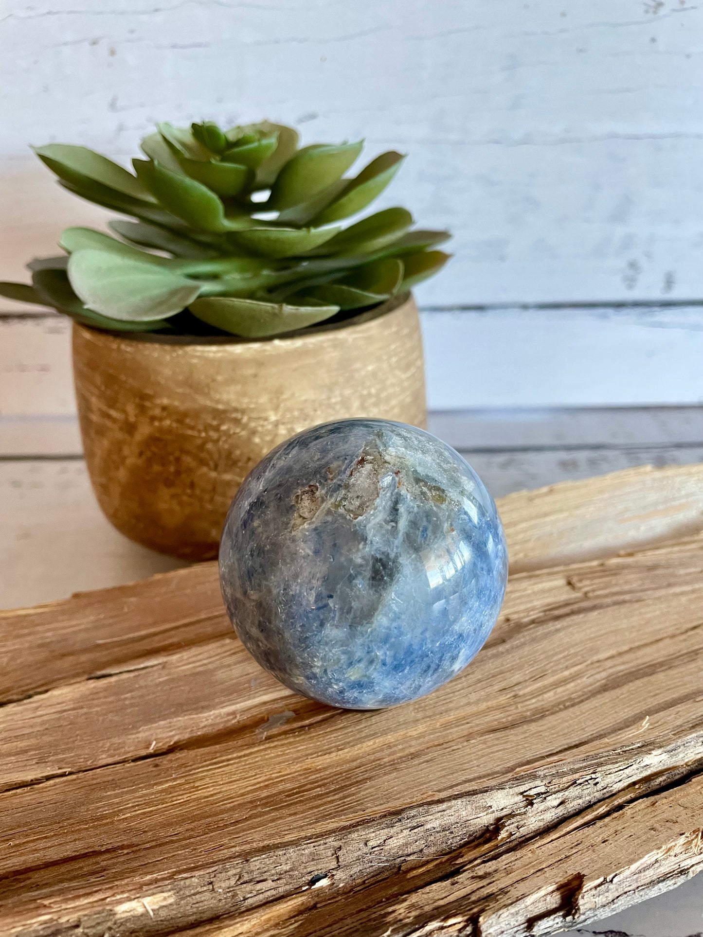 Kyanite Sphere Includes Wooden Holder