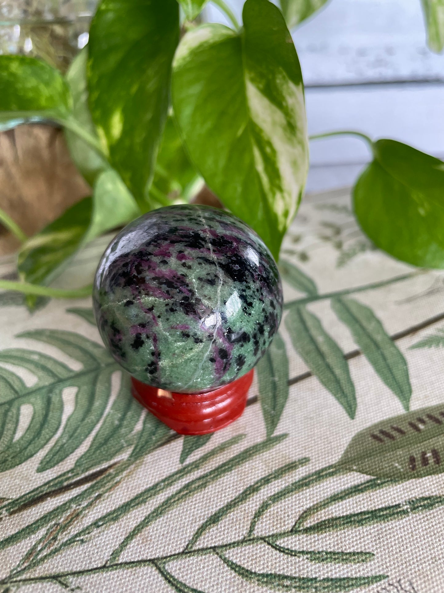 Ruby Zoisite Sphere Includes Wooden Holder