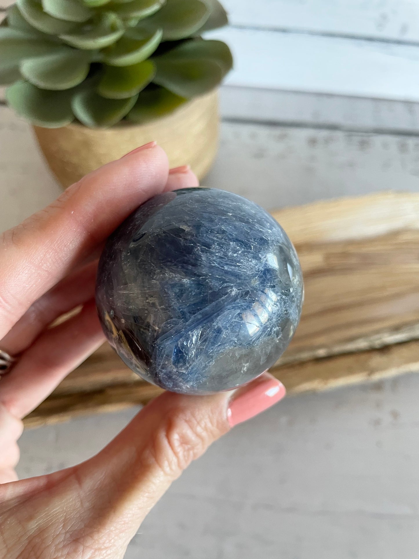 Kyanite Sphere Includes Wooden Holder