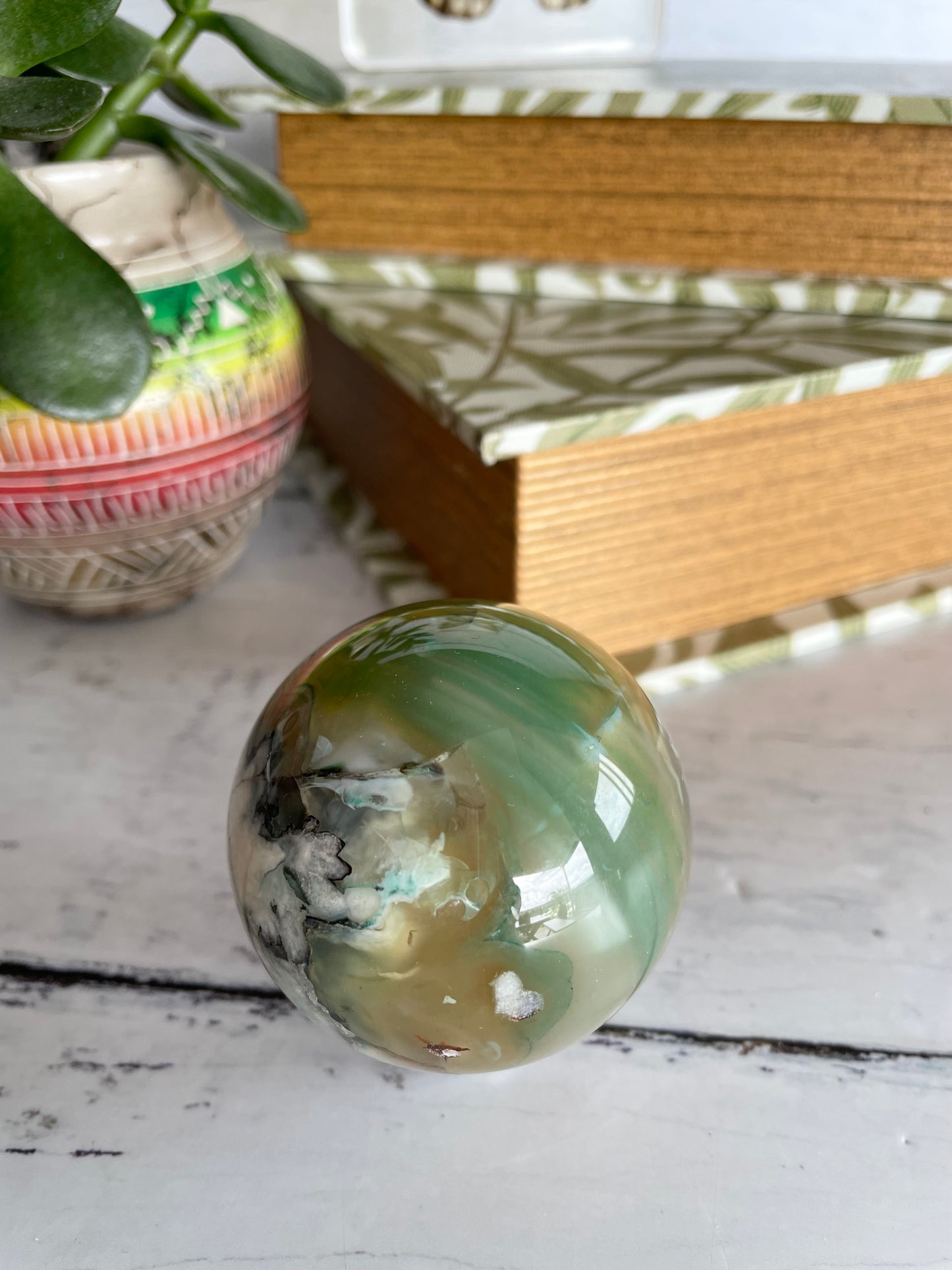 Green Flower Agate Sphere includes wooden holder