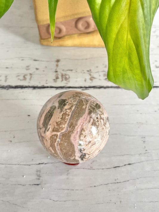 Rhodochrosite Sphere Includes Holder