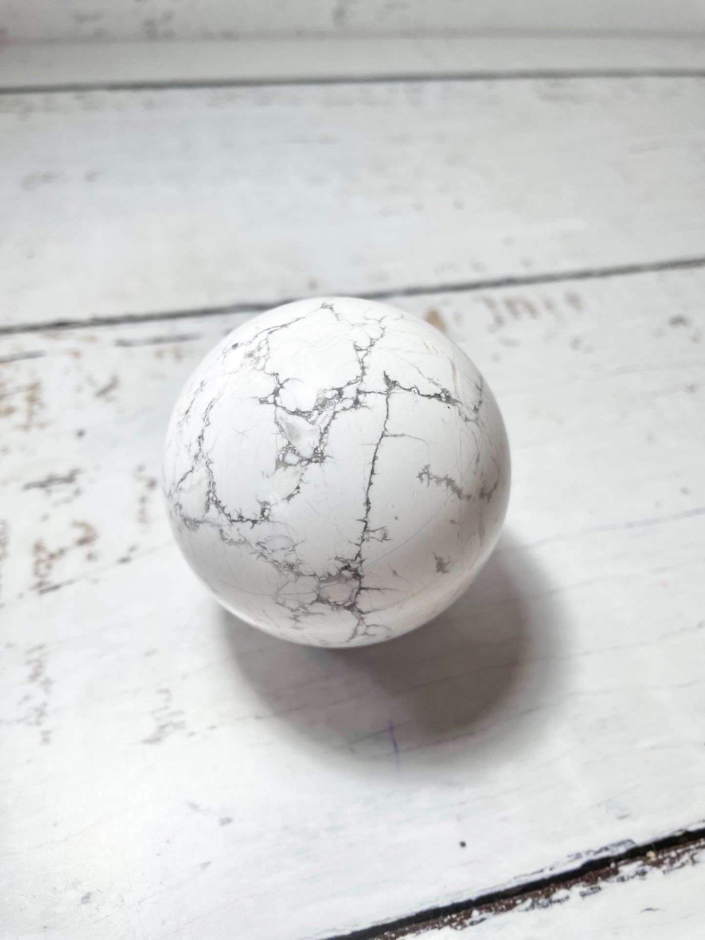 White Howlite Sphere includes holder