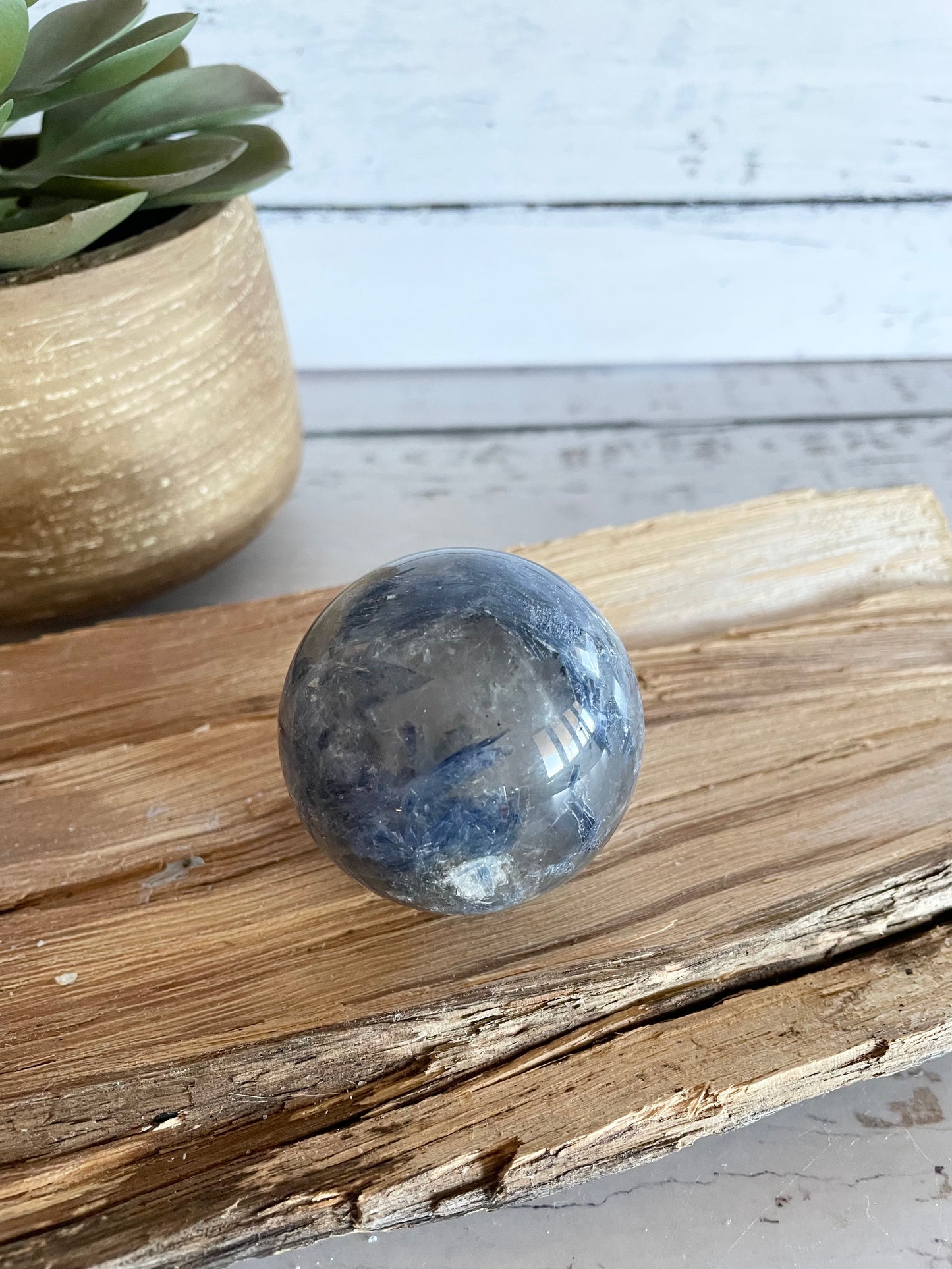 Kyanite Sphere Includes Wooden Holder