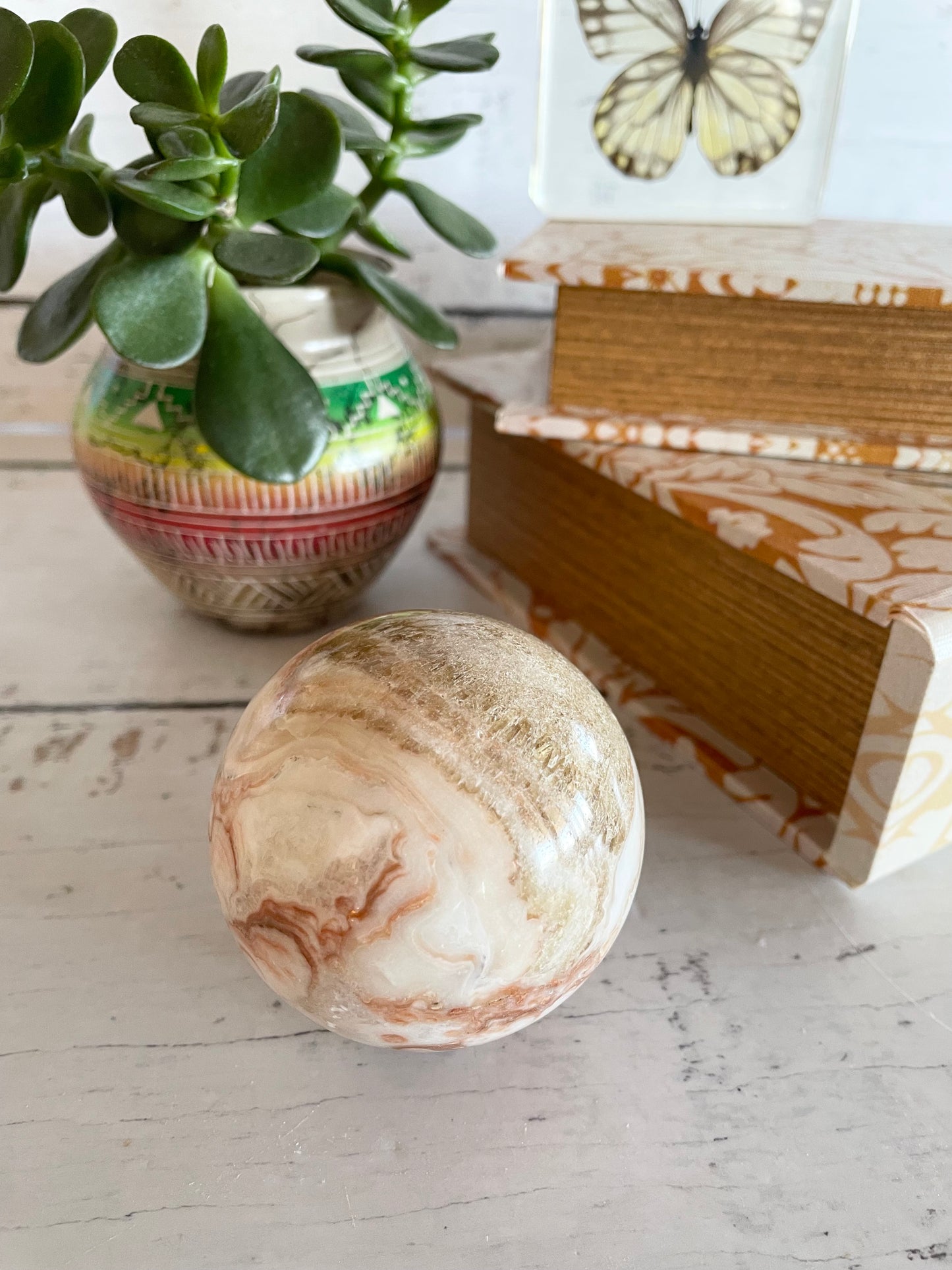 Calcite Sphere Includes Wooden Holder