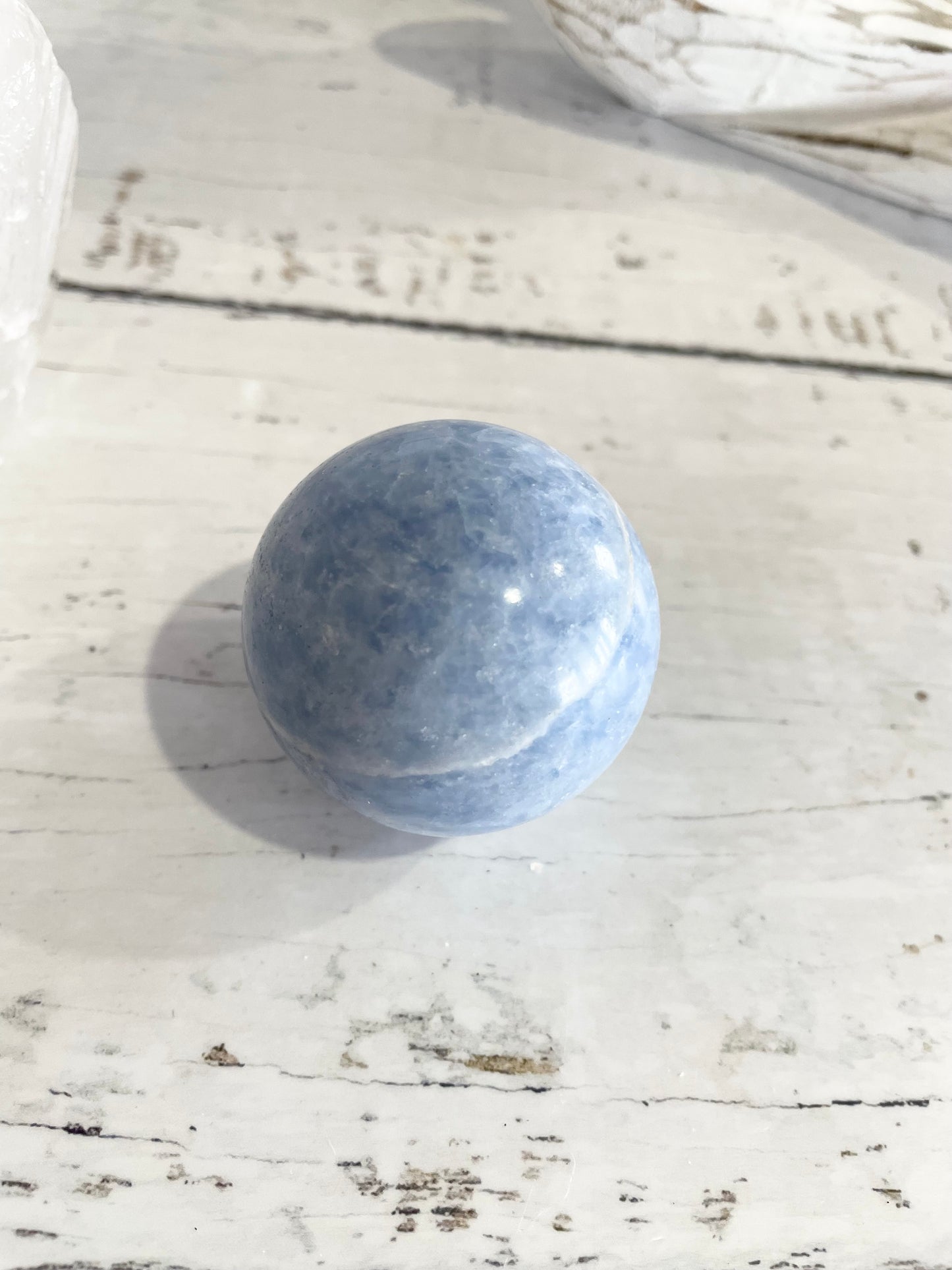Blue Calcite Sphere Includes Wooden Holder