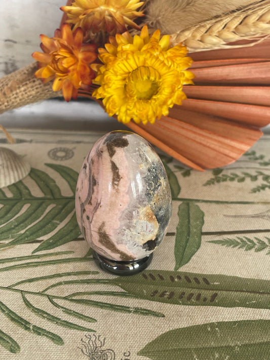 Rhodochrosite Egg Includes Hematite Ring