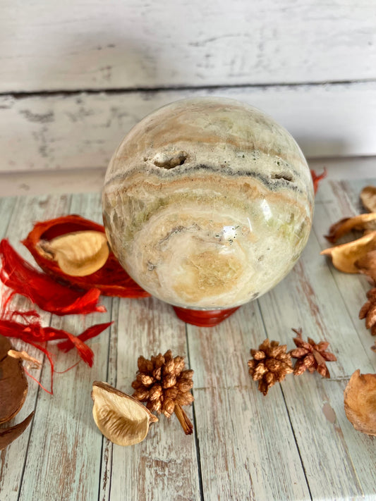 Green Calcite  Sphere Includes Wooden Holder