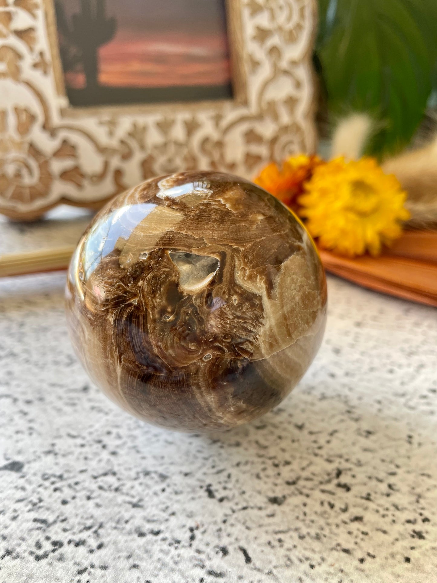 Chocolate Calcite Sphere Includes Wooden Holder