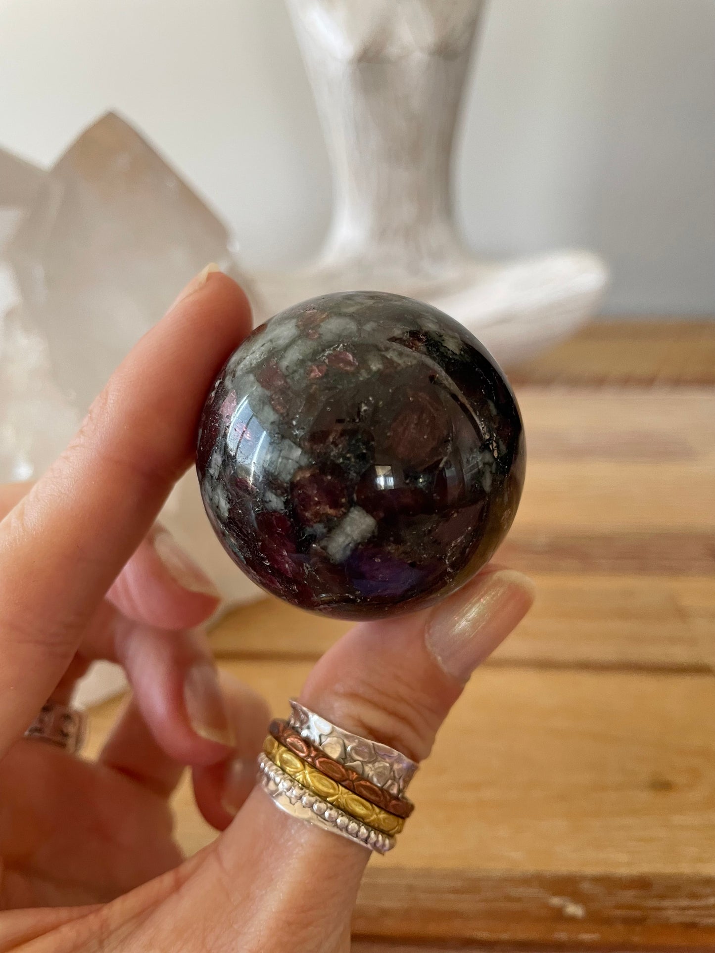 Eudialyte Sphere includes wooden holder