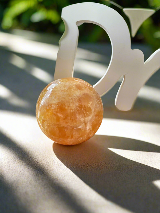 Orange Calcite Sphere Includes Holder