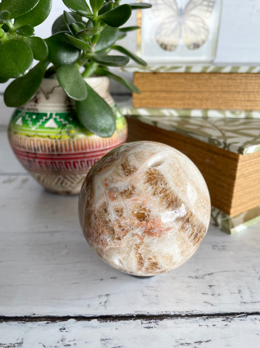 Amber Calcite Sphere Includes Wooden Holder