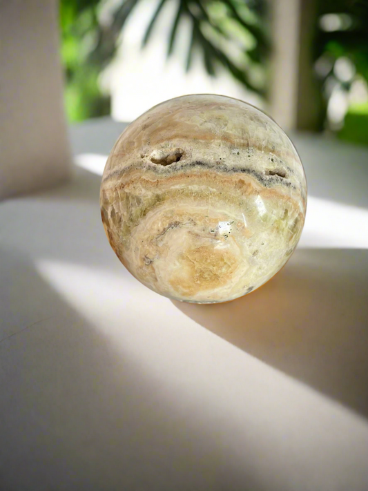 Green/Golden Calcite Sphere Includes Holder