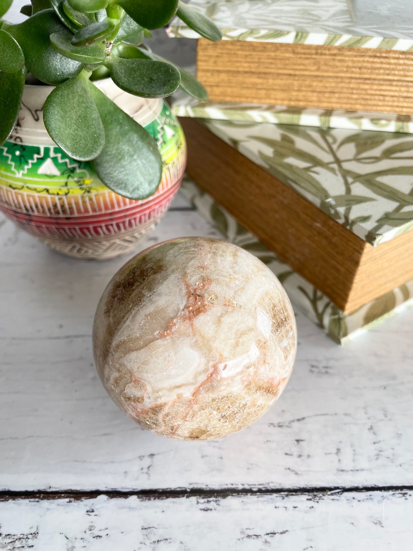 Amber Calcite Sphere Includes Wooden Holder