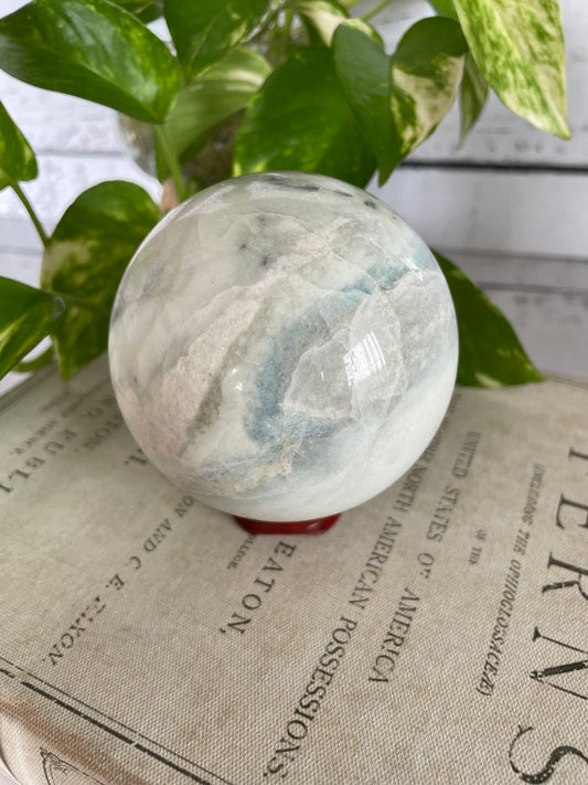 Caribbean Calcite Sphere Includes Wooden Holder